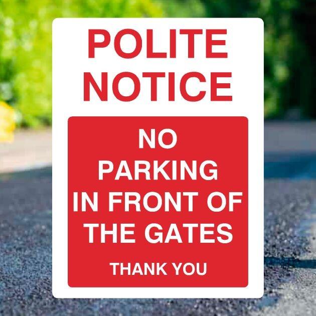 No Parking In Front Of The Gates Portrait Sign - UK Safety Signs Store